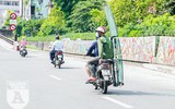 [ẢNH] Người lao động nhọc nhằn mưu sinh dưới thời tiết oi nóng của Hà Nội