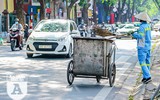 [ẢNH] Người lao động nhọc nhằn mưu sinh dưới thời tiết oi nóng của Hà Nội