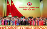 Hình ảnh các nữ đại biểu tham dự Đại hội XIII của Đảng