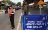 Indonesia: Không chịu đeo khẩu trang sẽ phải đi đào mộ cho các nạn nhân Covid-19 