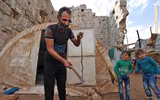 [Ảnh] Cảnh tha hương của người Syria khi lánh nạn trong các khu di tích cổ