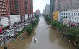 [Ảnh] Mưa lớn ‘nghìn năm có một’ gây lụt lội kinh hoàng ở tỉnh Hà Nam, Trung Quốc