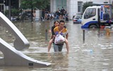 [Ảnh] Mưa lớn ‘nghìn năm có một’ gây lụt lội kinh hoàng ở tỉnh Hà Nam, Trung Quốc