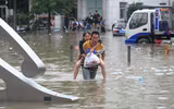 [Ảnh] Mưa lớn ‘nghìn năm có một’ gây lụt lội kinh hoàng ở tỉnh Hà Nam, Trung Quốc