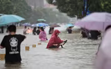 [Ảnh] Mưa lớn ‘nghìn năm có một’ gây lụt lội kinh hoàng ở tỉnh Hà Nam, Trung Quốc
