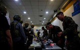 [Ảnh] Người tị nạn Afghanistan đến Mỹ trải qua sàng lọc an ninh thế nào?