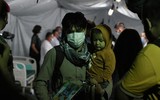 [Ảnh] Người tị nạn Afghanistan đến Mỹ trải qua sàng lọc an ninh thế nào?