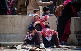 [Ảnh] Người tị nạn Afghanistan đến Mỹ trải qua sàng lọc an ninh thế nào?