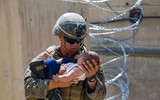 [Ảnh] Người tị nạn Afghanistan đến Mỹ trải qua sàng lọc an ninh thế nào?