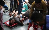 Những hình ảnh khó kìm lòng sau vụ không kích của Israel vào trại tị nạn ở Rafah