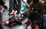 Những hình ảnh khó kìm lòng sau vụ không kích của Israel vào trại tị nạn ở Rafah
