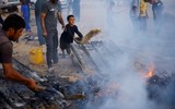 Những hình ảnh khó kìm lòng sau vụ không kích của Israel vào trại tị nạn ở Rafah