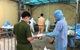 [Ảnh]: Hơn 1.000 cán bộ Công an Hà Nội lấy mẫu PCR xét nghiệm Covid