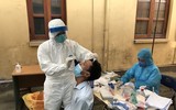 [Ảnh]: Hơn 1.000 cán bộ Công an Hà Nội lấy mẫu PCR xét nghiệm Covid