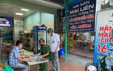 [Ảnh] Công an quận Đống Đa tuyên truyền, vận động nhân dân thực hiện Công điện 14