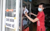 Người dân 'vùng xanh' tất bật chuẩn bị mở cửa hàng 