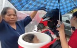 Hình ảnh lực lượng Công an dầm mình trong mưa lũ cứu người và di dời tài sản tại Hà Giang