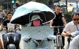 [ẢNH] 1.001 cách chống nóng “bá đạo” của người Việt