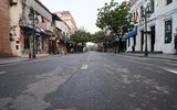 [Ảnh] Đường phố các tỉnh vắng lặng khi giãn cách phòng chống Covid-19 theo Chỉ thị 16