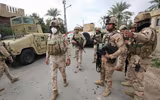 [Ảnh] Mỹ quyết định rút hết binh sĩ chiến đấu trực tiếp khỏi Iraq