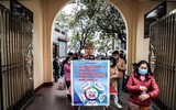 Hà Nội: Người dân thực hiện nghiêm biện pháp phòng dịch Covid-19 ngày mùng 1 Tết Tân Sửu 