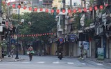 [ẢNH] Hà Nội ngày đầu giãn cách xã hội: Chen nhau đi chợ sớm, vẫn tập thể dục, cắt tóc ngoài đường...