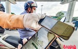 [ẢNH] Kiểm tra mã QR ở chốt ra vào vùng đỏ Hà Nội: Không ùn tắc, giấy đi đường cũ được lưu thông