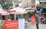 Cận cảnh chăm sóc ca mắc Covid-19 là trẻ em được điều trị tại nhà ở điểm nóng Hàng Thiếc