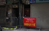 Cận cảnh chăm sóc ca mắc Covid-19 là trẻ em được điều trị tại nhà ở điểm nóng Hàng Thiếc