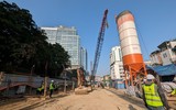 Nụ cười tươi rói của công nhân trên công trình trọng điểm làm xuyên tết ở Thủ đô