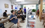 Độc đáo robot làm nhân viên AI phục vụ hành chính công tại Hà Nội