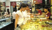 Giá vàng sụt giảm gần 100.000 đồng/lượng