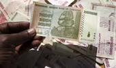 Cạn tiền mặt, Zimbabwe sắp in phiên bản đồng USD