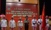 NXB Công an nhân dân đón nhận Huân chương Lao động hạng Ba 