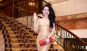 Hoa hậu Huỳnh Thúy Anh đẹp quyến rũ trong dạ tiệc đầu xuân