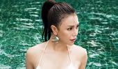 Trà Ngọc Hằng khoe vòng 1 nóng bỏng bên hồ bơi