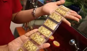 Giá vàng trong nước giảm mạnh sau khi vàng thế giới mất mốc 4.000 USD/ounce