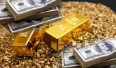 Giá vàng tăng 12,53% trong tháng 10, USD giảm nhẹ