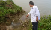 Xác nam thanh niên đang phân hủy trên sông Hồng