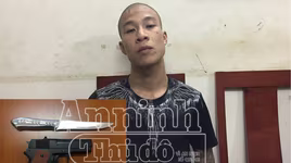 Cận mặt đối tượng dùng súng khống chế bắt cóc con tin ở Thường Tín