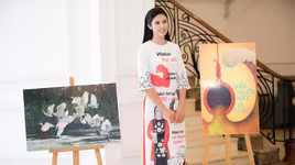 Hoa hậu Ngọc Hân thiết kế áo dài mang thông điệp bảo vệ nước