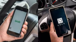 Grab-Uber Đông Nam Á về một nhà: Lái xe Uber rối bời lo lắng...