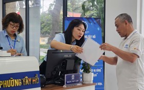 Hà Nội ngày đầu vận hành chính quyền địa phương hai cấp: Nghiêm túc, chu đáo phục vụ nhân dân