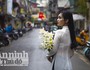 Thiếu nữ Hà Nội đẹp lạ bên hoa loa kèn tháng tư