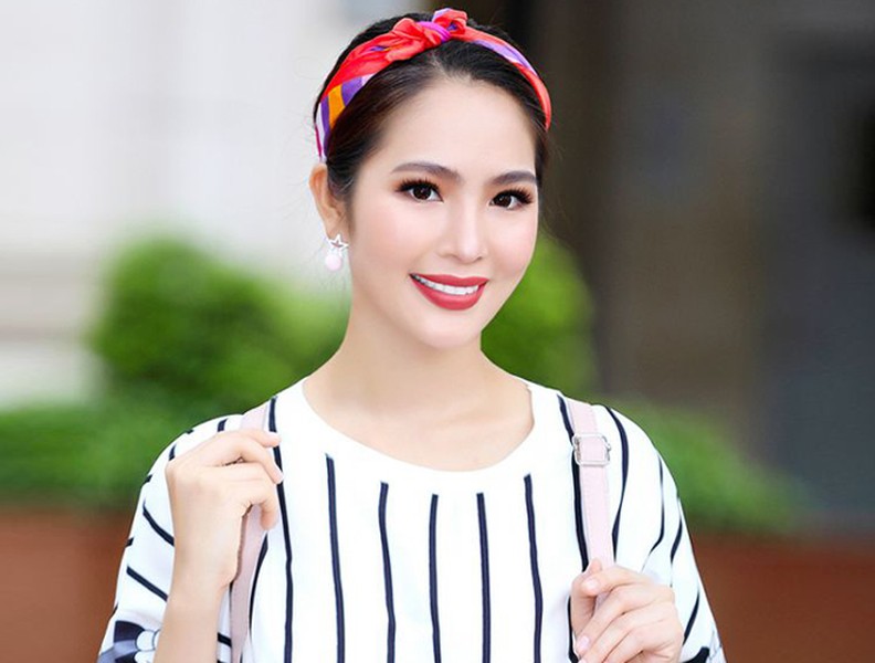 Hoa hậu Dương Kim Ánh trẻ trung xuống phố mùa thu
