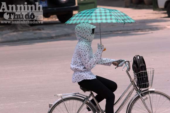 "Cuộc chiến" gìn giữ nhan sắc giữa trời 40 độ ảnh 9