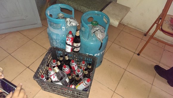 Hai anh em ruột dùng "bom" xăng, gas chống người thi hành công vụ ảnh 2