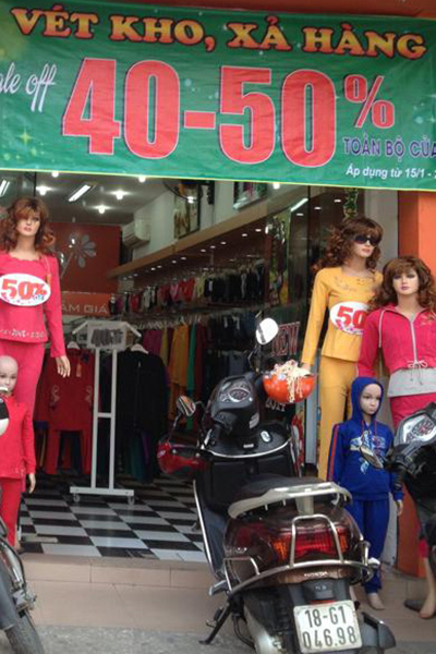 Thời trang Tết: Đua nhau giảm giá, xả hàng ảnh 1