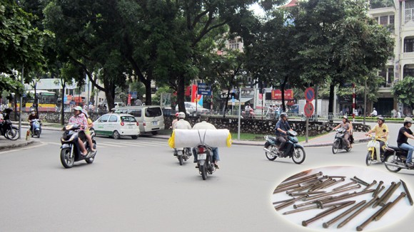 Hàng cân đinh rải trên phố ảnh 1