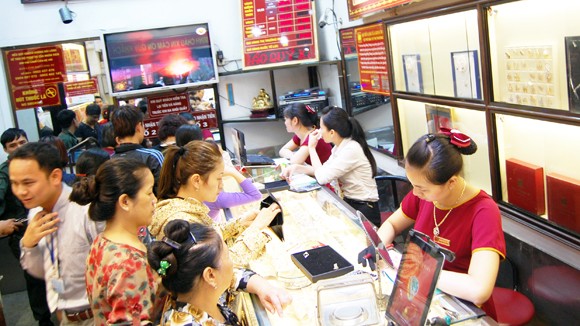 Giá vàng tuột dốc không phanh ảnh 1